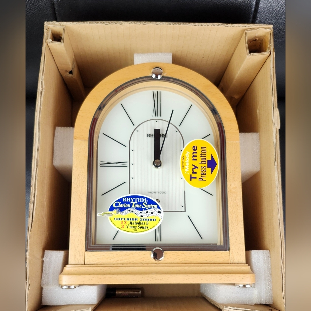 Rhythm Melody Wooden Mantel Clock.